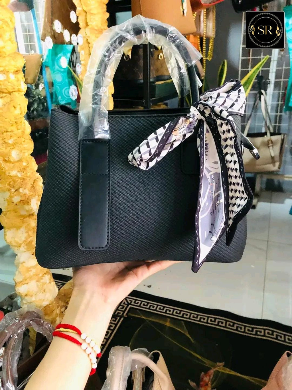 HANDBAG AND SHOULDER SLING BAG