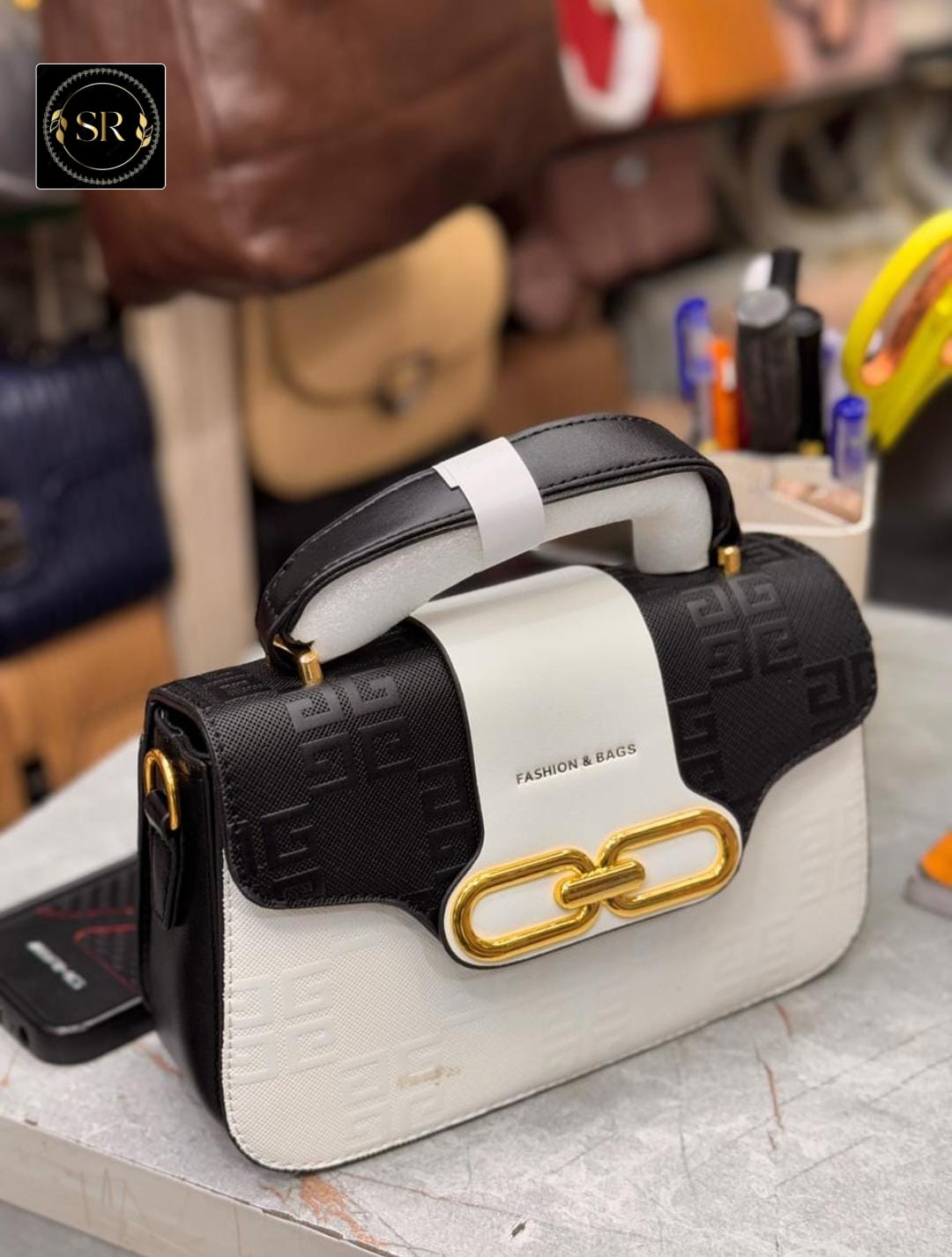 IMPORTED HANDBAG AND SLING BAG
