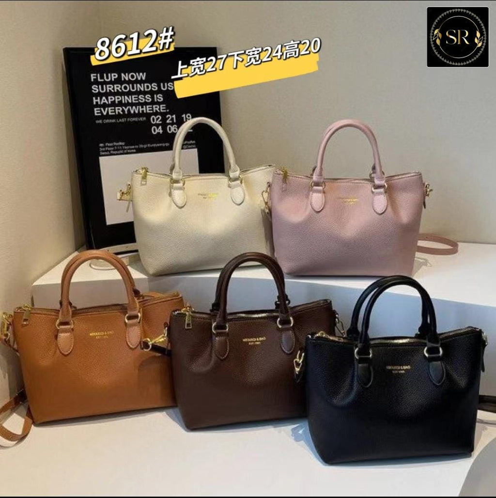 IMPORTED HANDBAG AND SHOULDER SLING BAG .