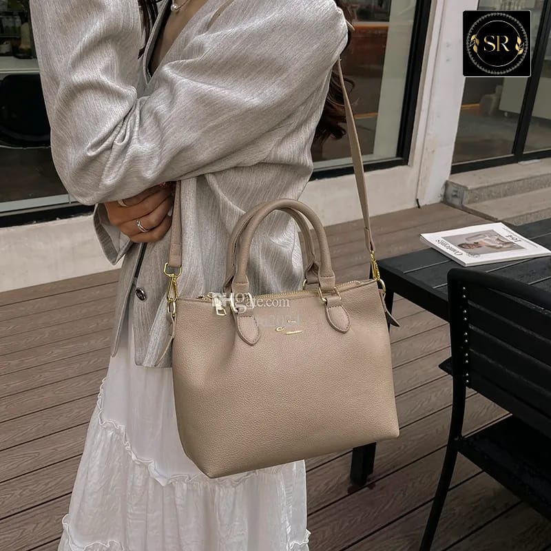 IMPORTED HANDBAG AND SHOULDER SLING BAG .