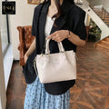 IMPORTED HANDBAG AND SHOULDER SLING BAG .