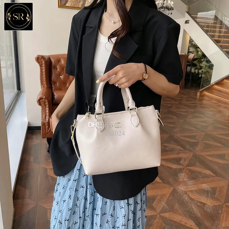 IMPORTED HANDBAG AND SHOULDER SLING BAG .